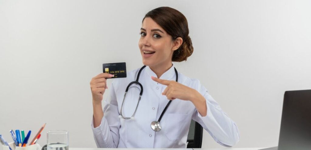 Doctor holding card